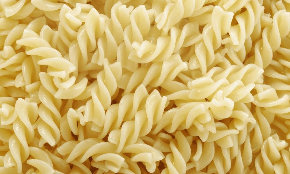 Close up photo of cooked fusilli pasta taking up the whole photo frame