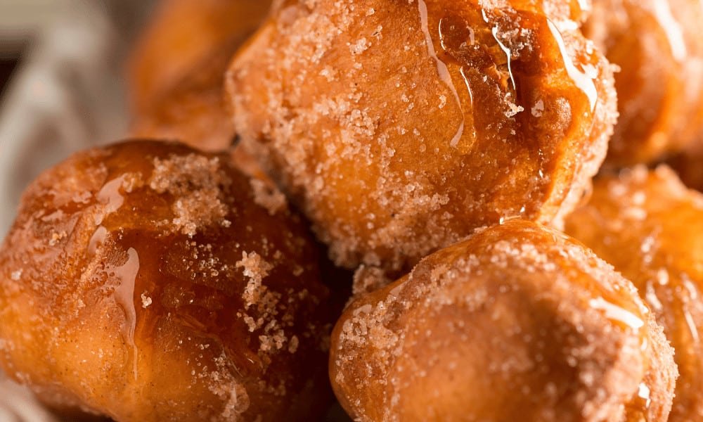 Zeppole With Icing Sugar and Syrup